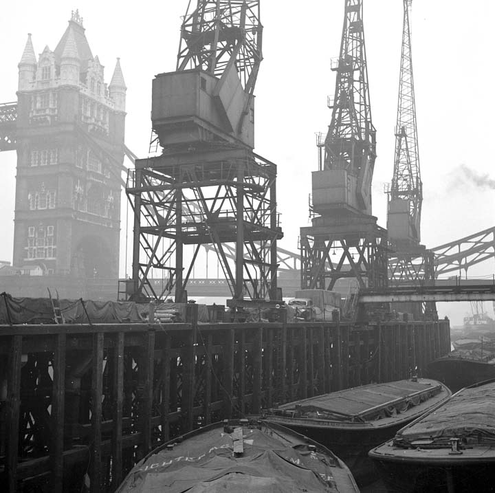 The Long Memory-Tower Bridge with cranes from St. Katherine Docks.